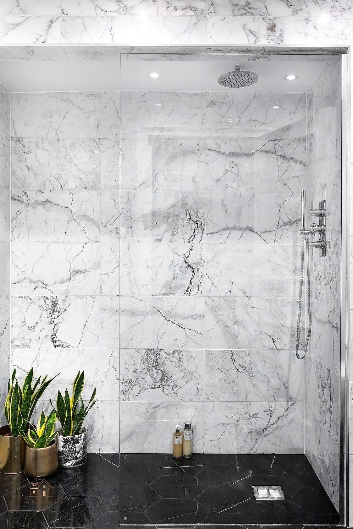 26 Gorgeous Stone Shower Ideas That Are Totally Doable 11 Black Marble Walls for Drama