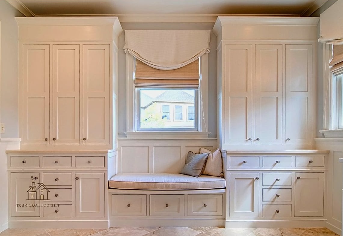 Built-In Window Seat With Flanking Closets