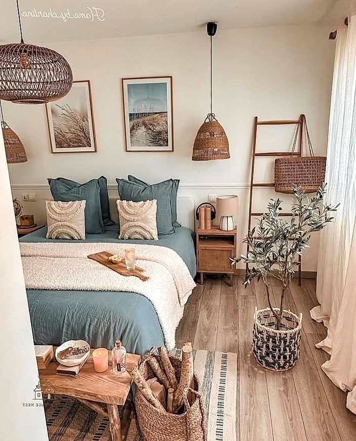 35 Gorgeous Coastal Bedroom Ideas That Are Totally Doable 29 Choose a Woven Basket for Extra Blankets
