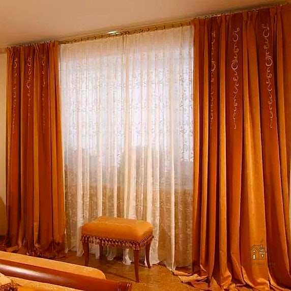 40 Clever Bedroom Curtain Ideas for Every Style 22 Curtains in a Warm Terracotta Tone