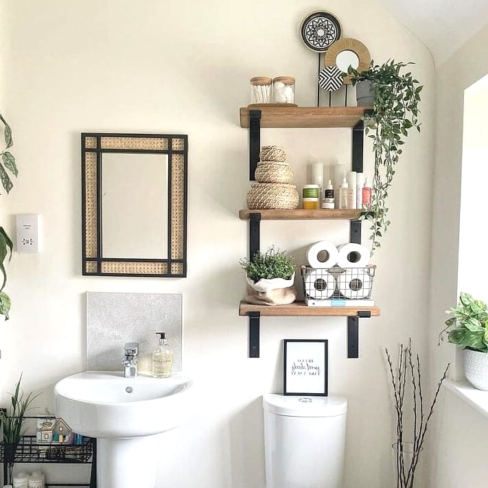 35 Chic Back Of Toilet Decor Ideas for a Beautiful Home 3 Floating Shelves Above the Tank