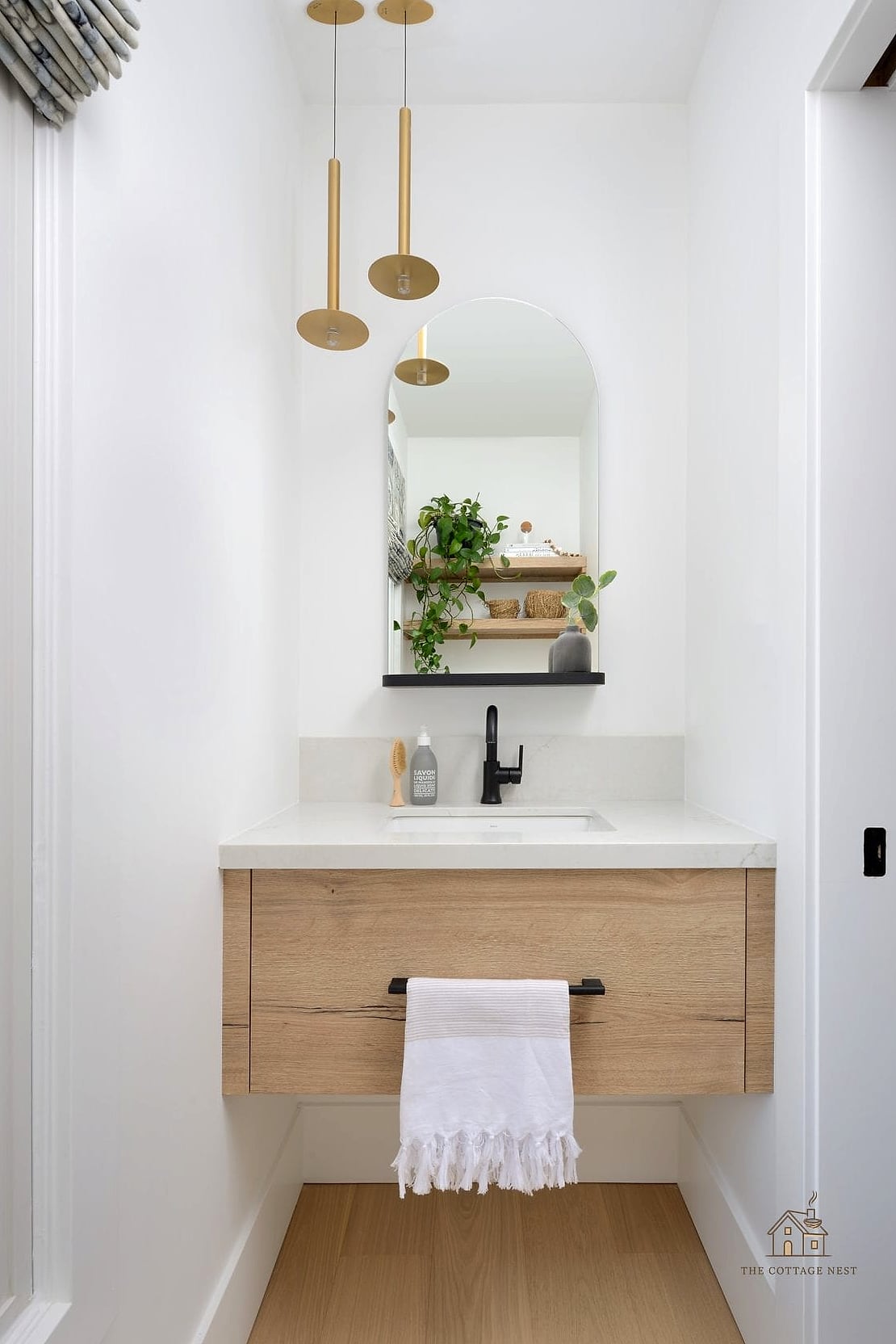 30 Clever Powder Room Ideas for Every Style 5 Floating Vanity with Brass Hardware