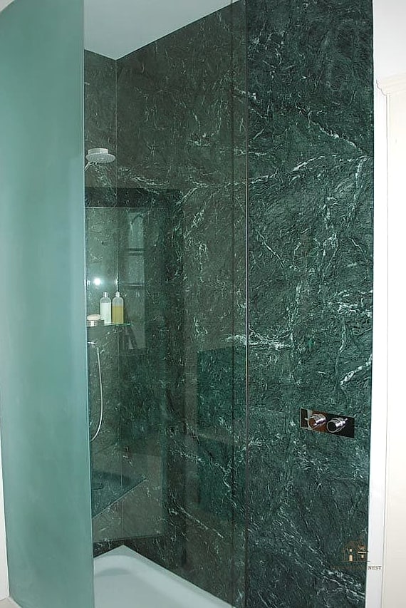 26 Gorgeous Stone Shower Ideas That Are Totally Doable 21 Green Marble for a Bold, Nature-Inspired Look