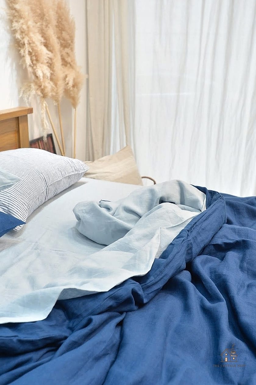 15 Brilliant Stockholm Style Bedroom to Copy Right Now 5 Layered Linen Bedding in Neutral Tones