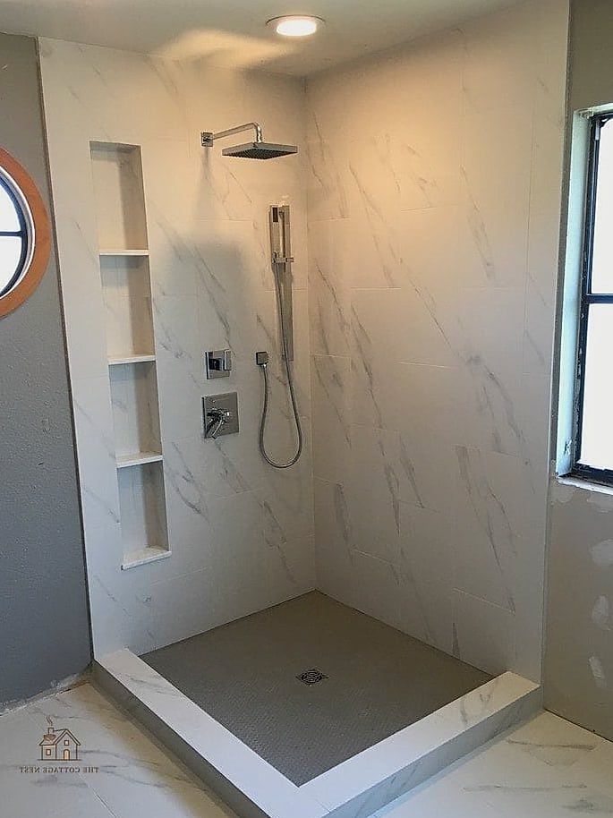 30 Cozy Shower Tile Ideas Worth Pinning 11 Marble-Look Porcelain Slabs