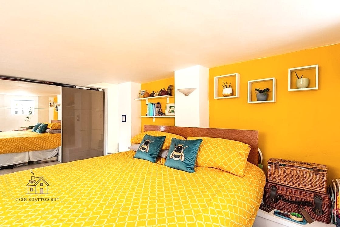 26 Beautiful Yellow Bedroom Ideas to Transform Your Space 22 Marigold Accent Rug