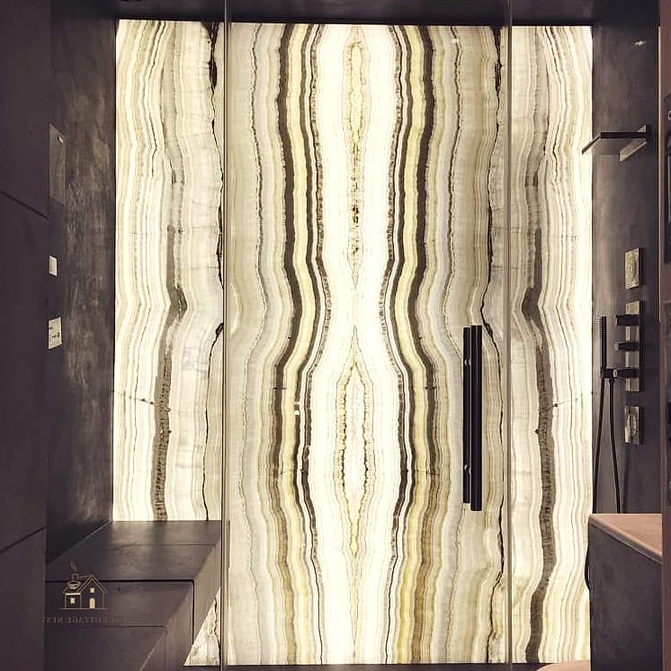 26 Gorgeous Stone Shower Ideas That Are Totally Doable 15 Onyx Backlit Shower Wall