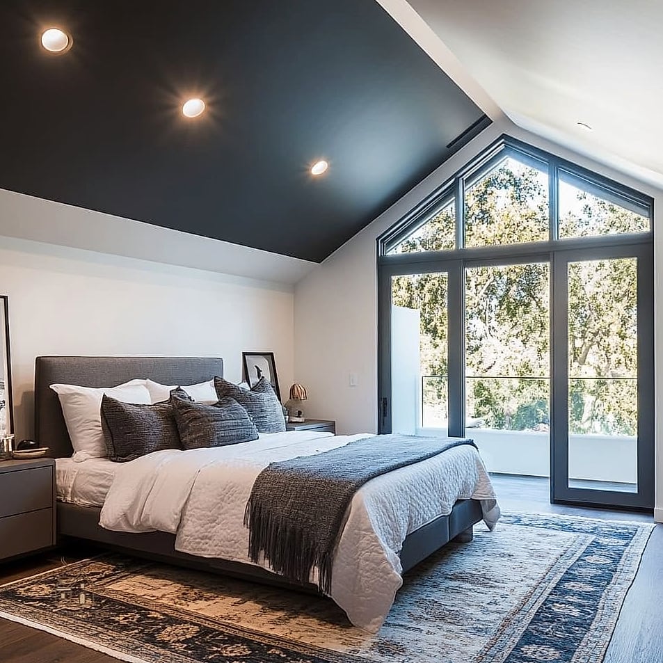 23 Clever Attic Bedroom Ideas for Every Style 19 Paint the Ceiling a Deeper Color Than the Walls