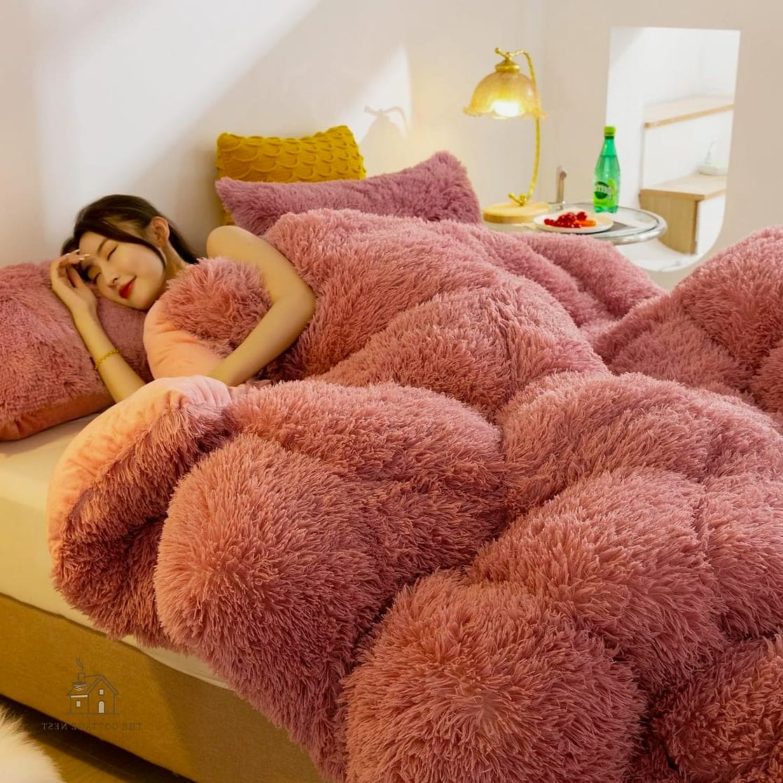 20 Cozy Dark Feminine Bedroom Ideas Worth Pinning 9 Plush Faux Fur Throw and Pillows