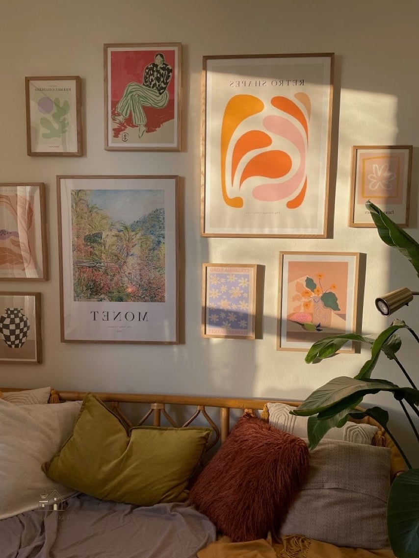 A Shared Gallery Wall Above the Beds