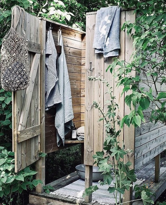 25 Stunning Outdoor Shower Ideas You'll Absolutely Love 22 Slatted Wood Fence Enclosure
