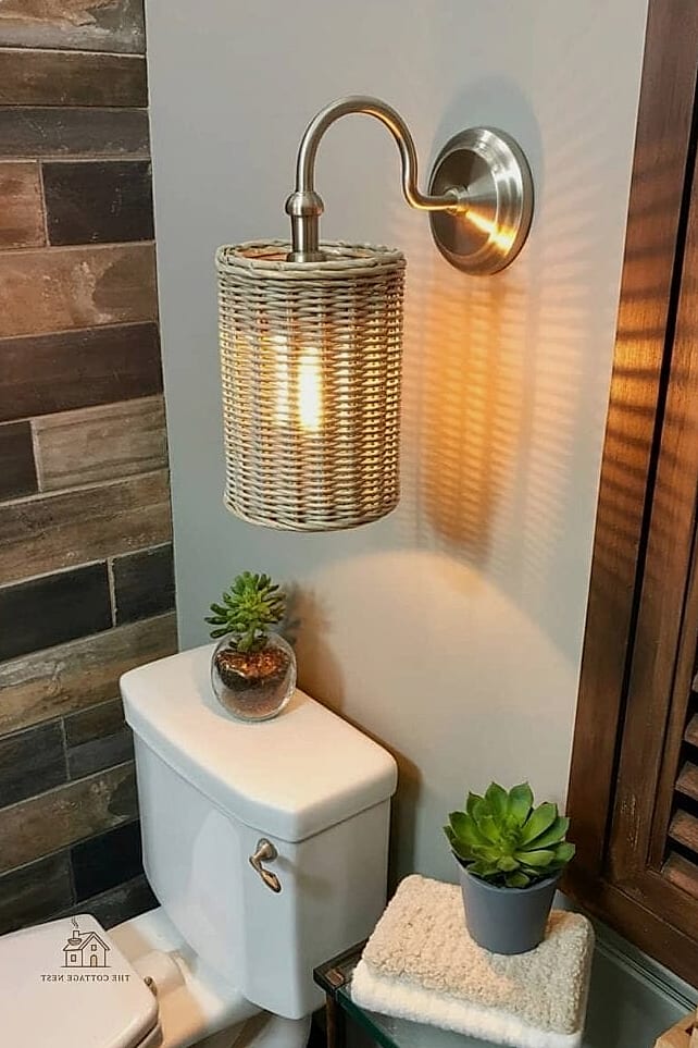 35 Chic Back Of Toilet Decor Ideas for a Beautiful Home 23 Statement Sconce Lighting
