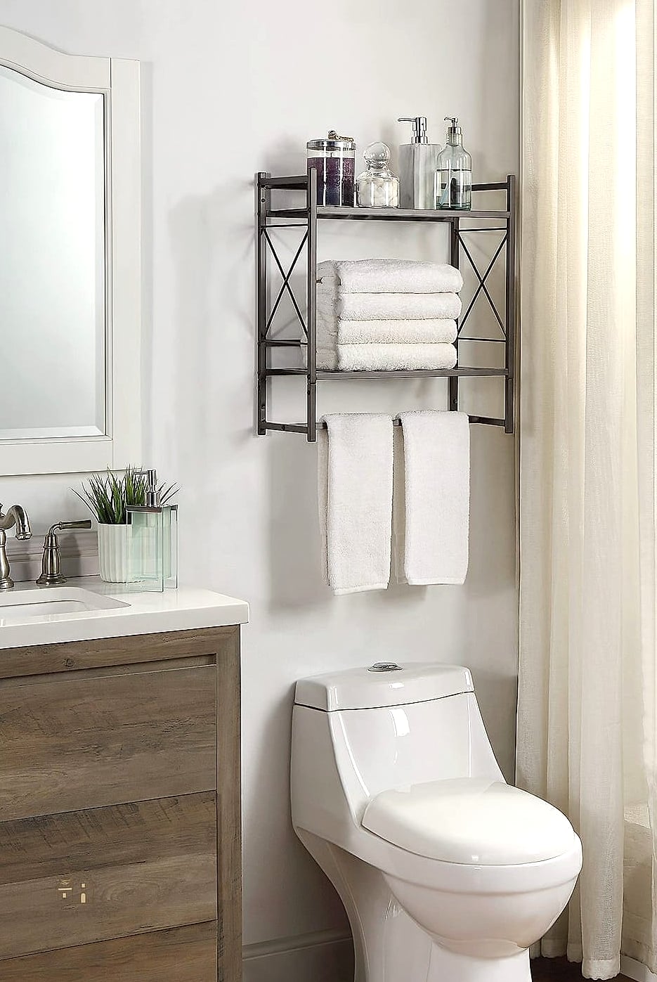 25 Creative Over The Toilet Storage Ideas That Will Inspire You 22 Towel Ladder with Top Shelf