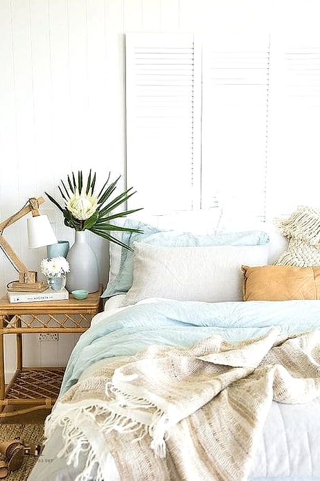 35 Gorgeous Coastal Bedroom Ideas That Are Totally Doable 35 Use Ceramic or Stoneware Vases With Dried Grasses