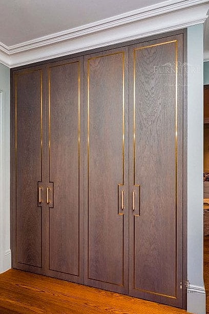 23 Clever Built In Wardrobe Around Bed for Every Style 24 Wardrobe with Antique Brass and Dark Wood Finish