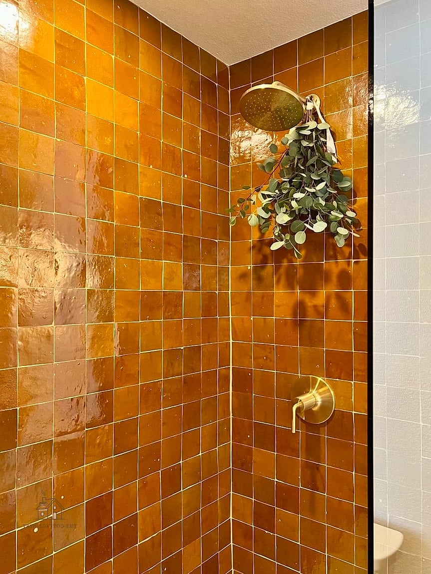 30 Cozy Shower Tile Ideas Worth Pinning 2 Warm Zellige Tile in Honey Tones