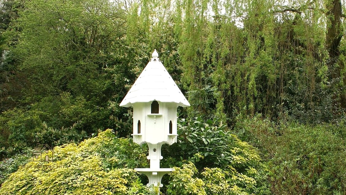 30 Dreamy English Garden Ideas to Try This Season 23 Add a Dovecote or Birdhouse Feature