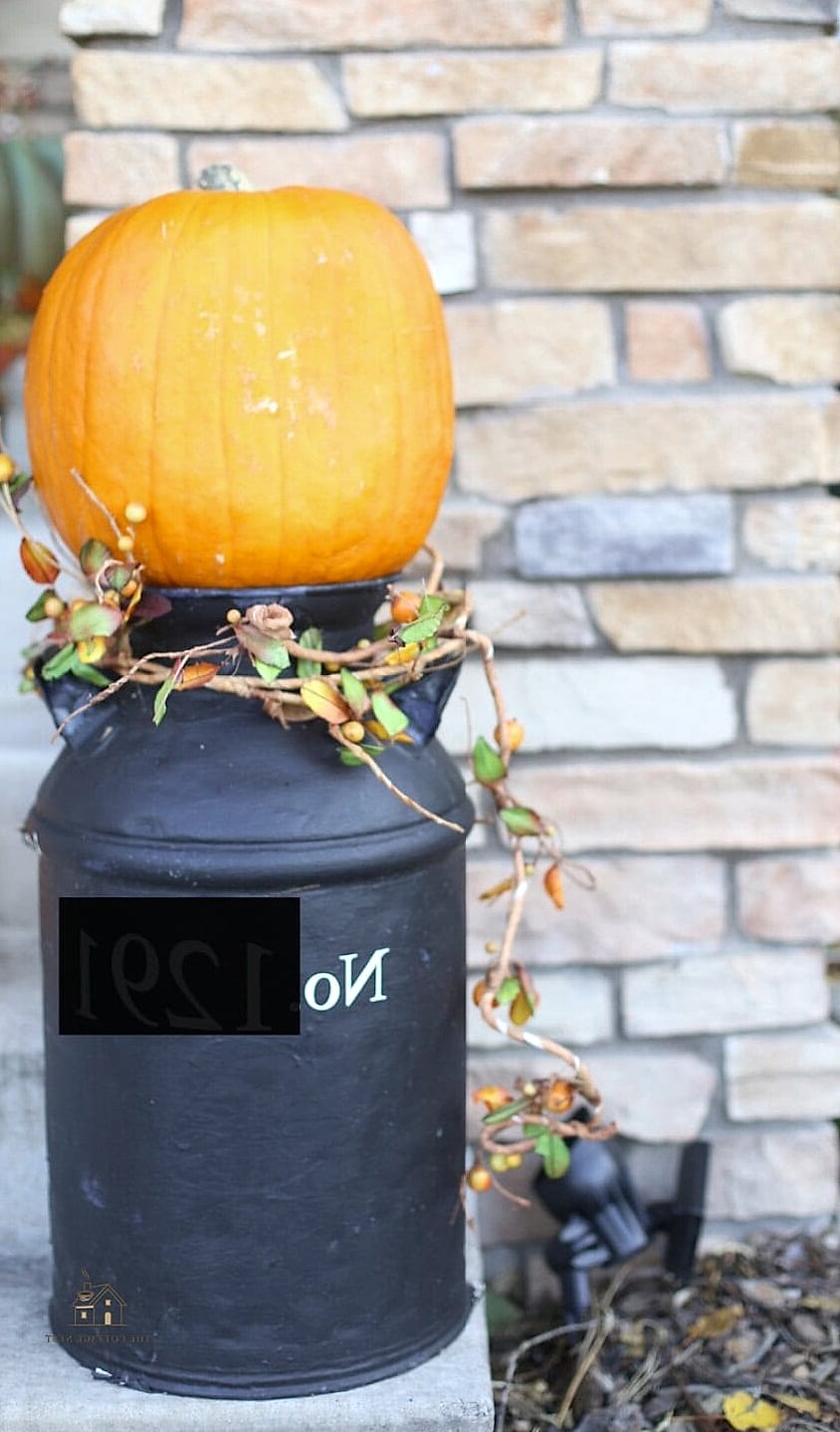 45 Gorgeous Fall Front Porch Decor Ideas That Are Totally Doable 37 Antique Milk Cans as Accents