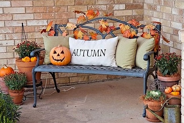 15 Brilliant Fall Outdoor Planter Ideas to Copy Right Now 5 Black Iron Urns with Fall Grasses