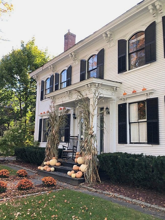 45 Gorgeous Fall Front Porch Decor Ideas That Are Totally Doable 24 Black Shutters with Orange Accents