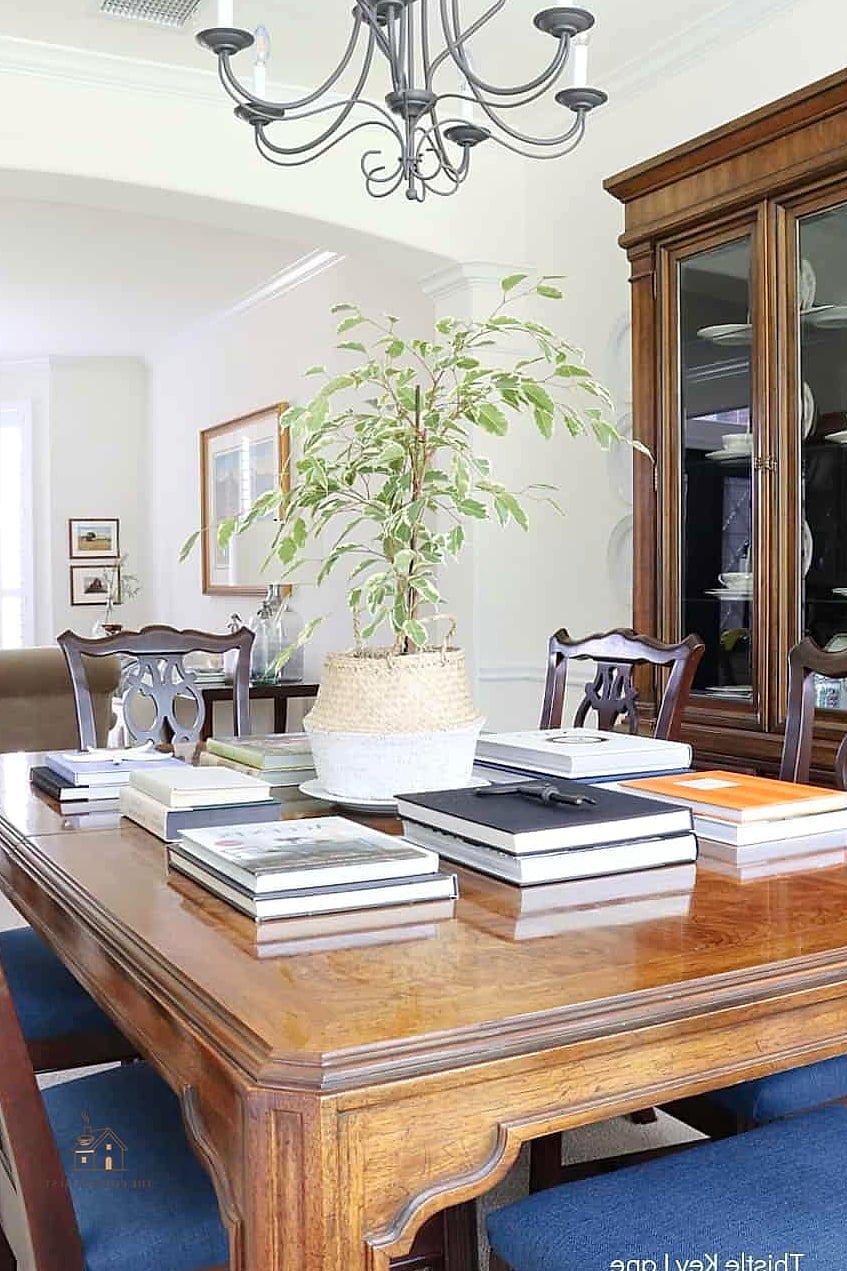 40 Beautiful Dining Room Table Decor Ideas to Transform Your Space 8 Books as a Styling Base