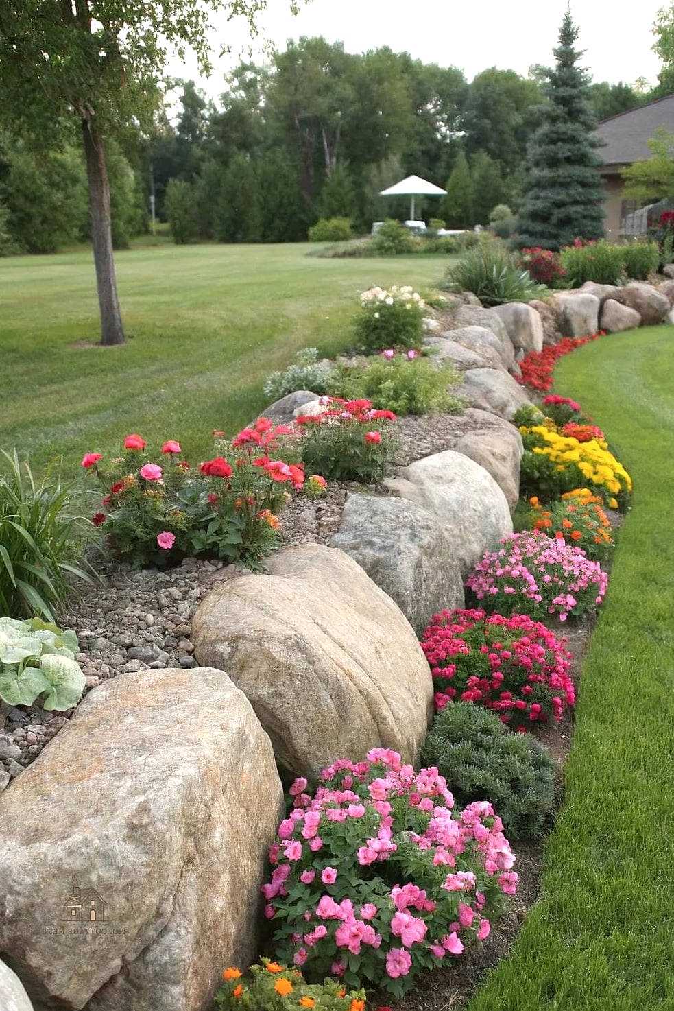50 Beautiful Garden Border Ideas to Transform Your Space 36 Boulders as Border Accents