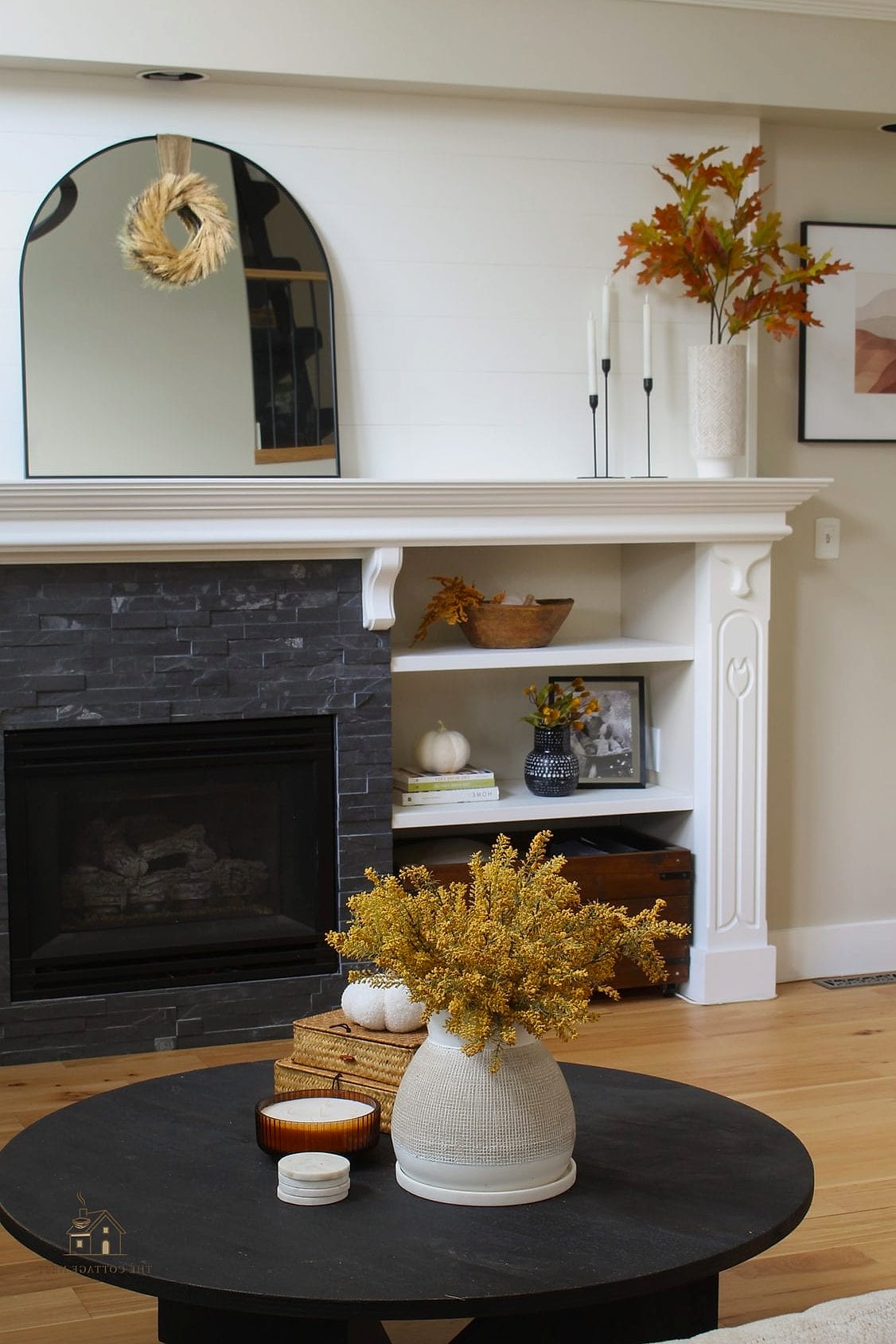 Bring In a Faux Fireplace Mantel
