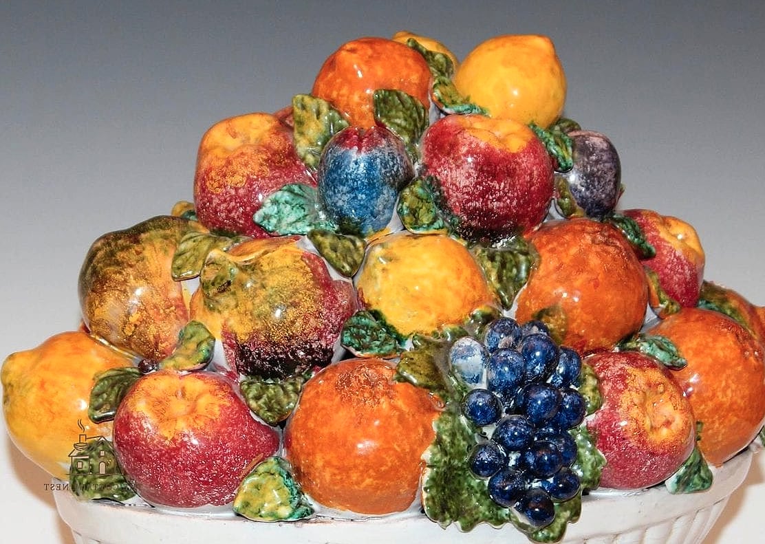 40 Beautiful Dining Room Table Decor Ideas to Transform Your Space 13 A Ceramic Fruit Bowl with Seasonal Produce