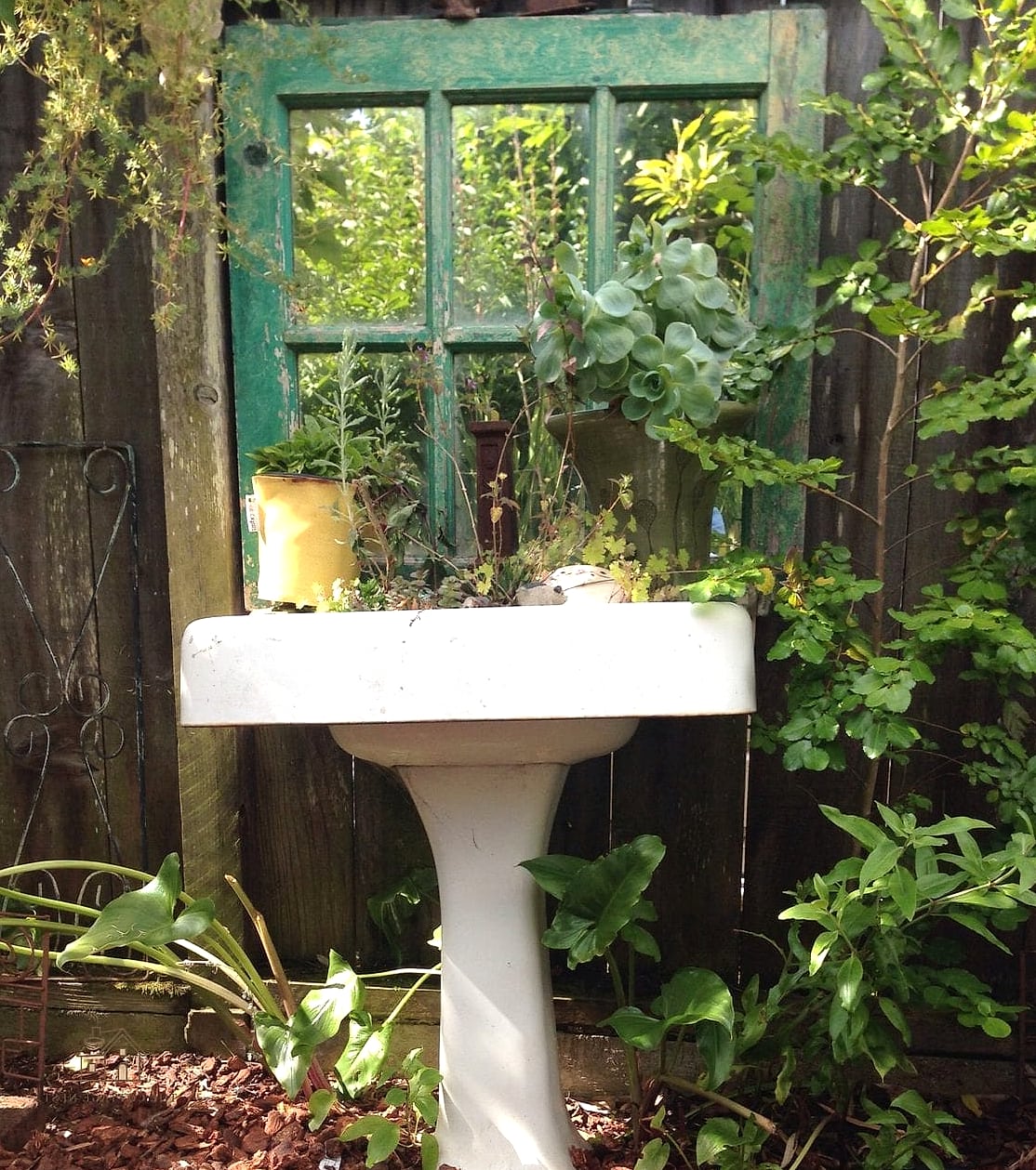 50 Clever Junk Garden Ideas Repurposed for Every Style 15 Chipped Sink Planter