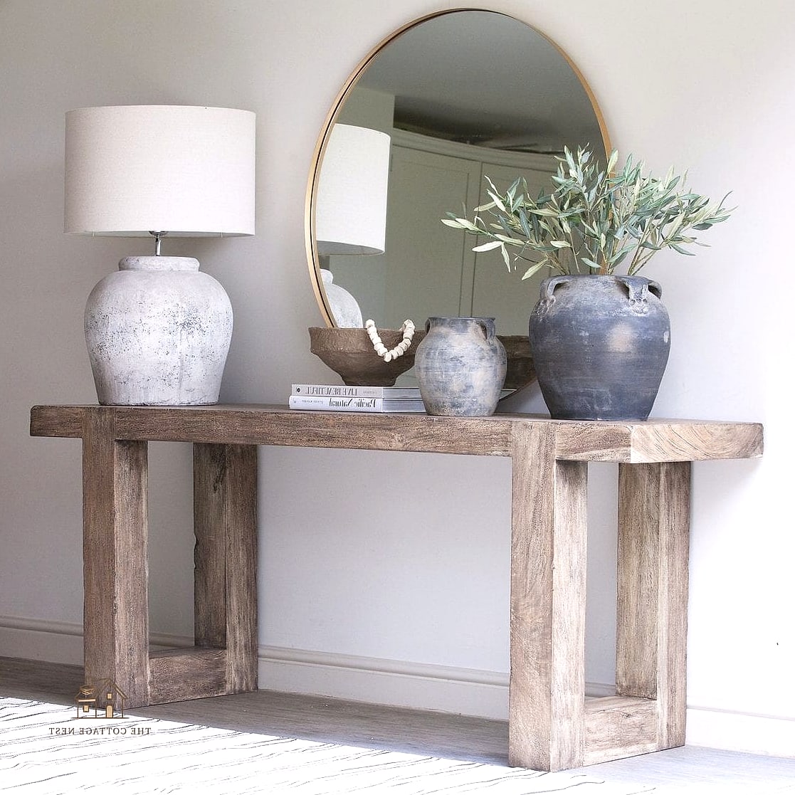 25 Chic Entryway Table Decor Ideas for a Beautiful Home 16 A Chunky Ceramic or Stone Sculpture
