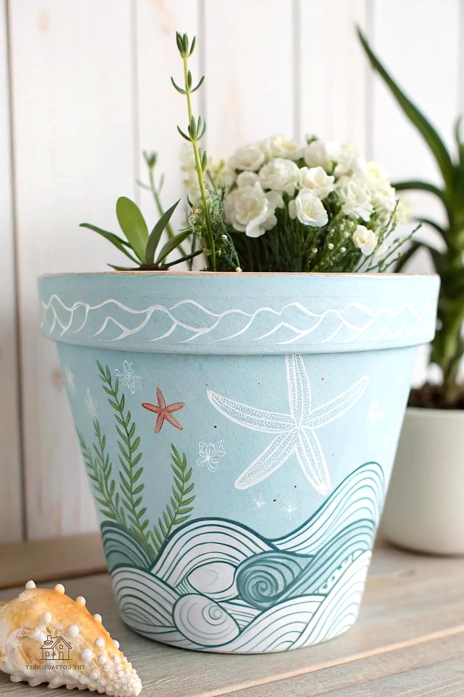 30 Amazing Flower Pots Painting Ideas on a Budget 25 Coastal Blue and White Wave Pattern