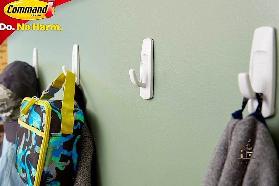 30 Amazing Budget Friendly Garage Organization And Storage Ideas on a Budget 21 Command Hook Organization