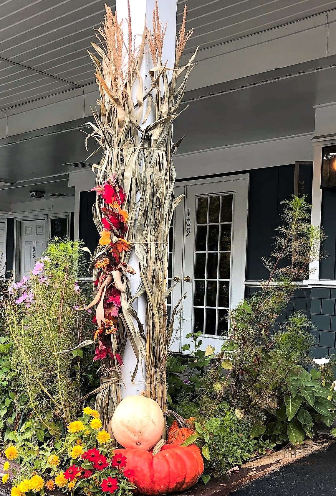15 Creative Beautiful Fall Front Porch Decor Ideas That Will Inspire You 10 Corn Stalks Flanking the Front Door