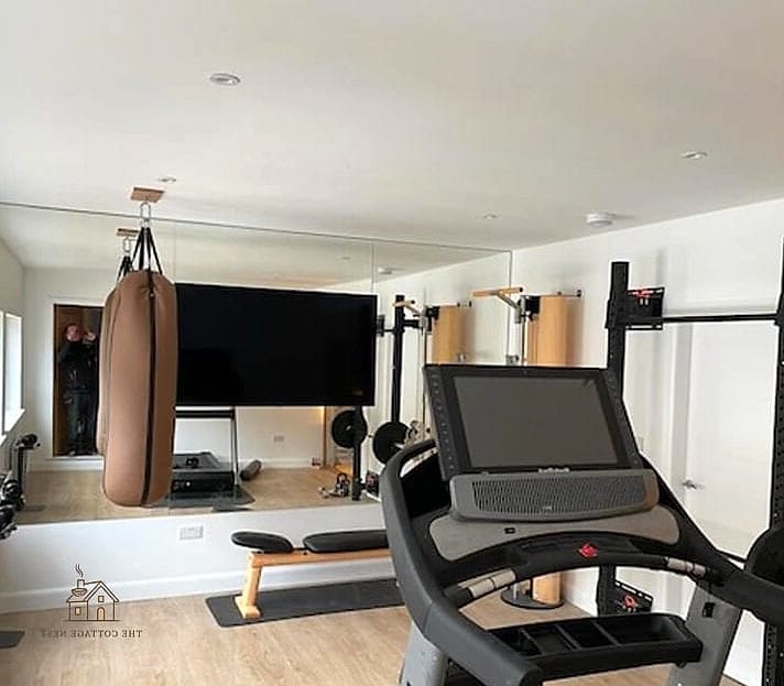 50 Beautiful Garage Gym Ideas to Transform Your Space 28 Cushioned Bench with Storage