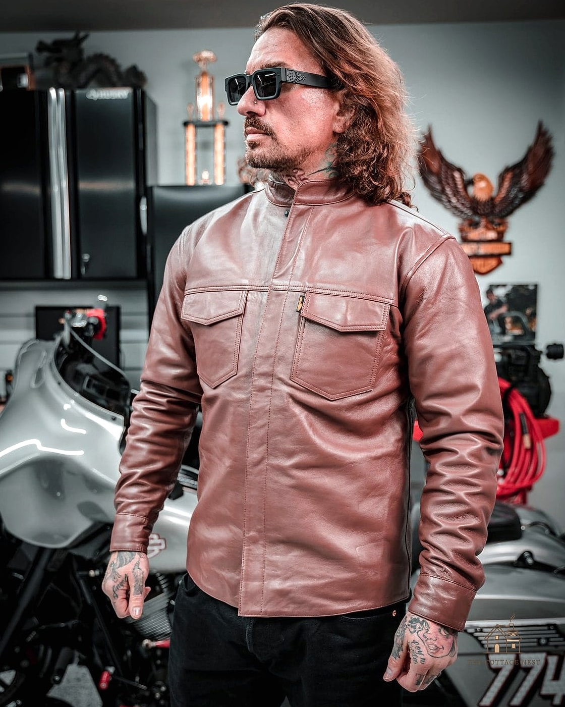50 Clever Garage Man Cave Ideas for Every Style 41 Distressed Leather and Wood Combo