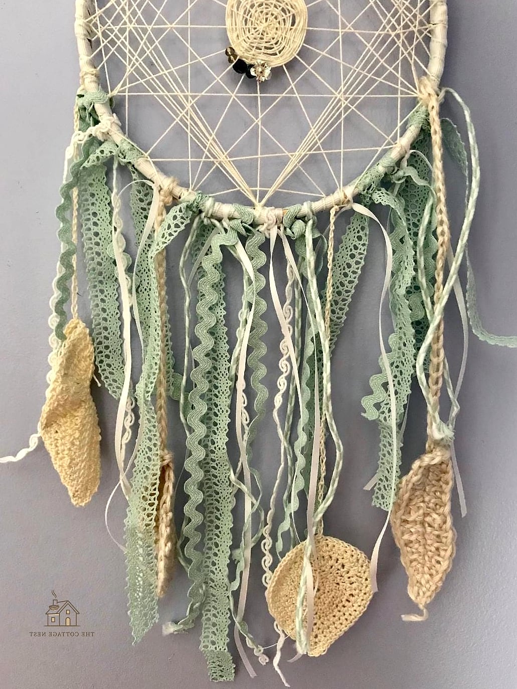 45 Brilliant Boho Garden Ideas to Copy Right Now 17 A Dreamcatcher or Woven Wall Hanging