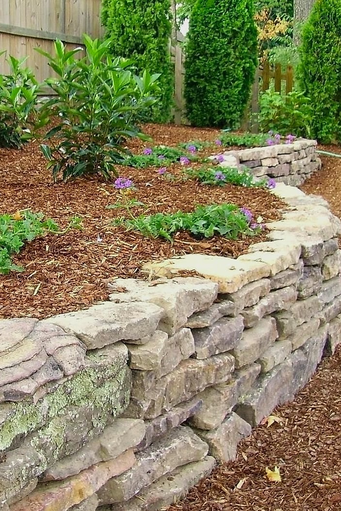 50 Beautiful Garden Border Ideas to Transform Your Space 15 Dry Stack Stone Wall Border