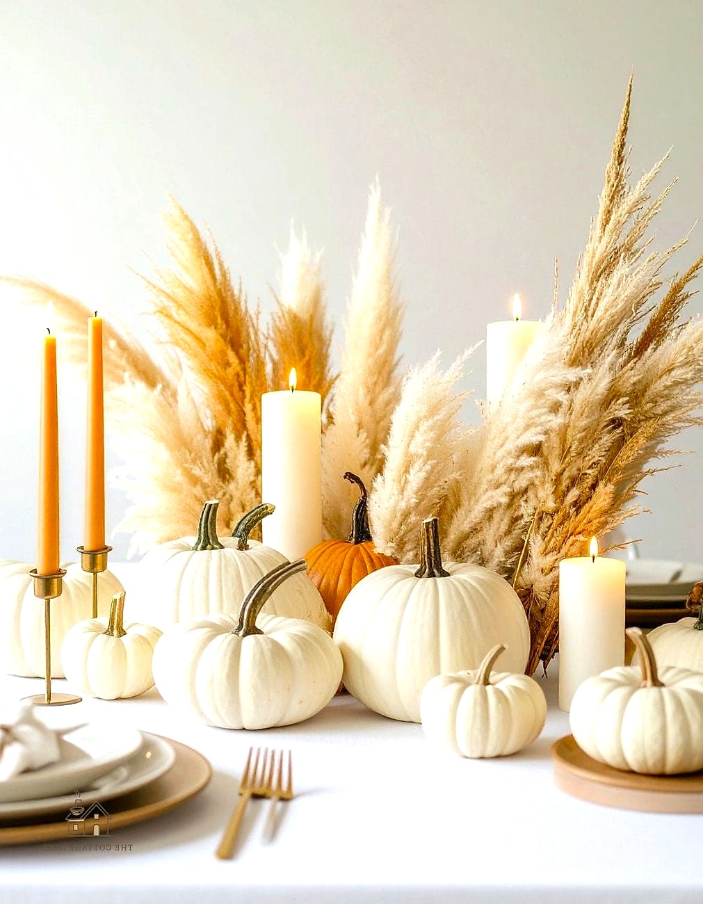 35 Beautiful Fall Table Centerpiece Ideas to Wow Your Guests 34 Feather and Pampas Grass Arrangement