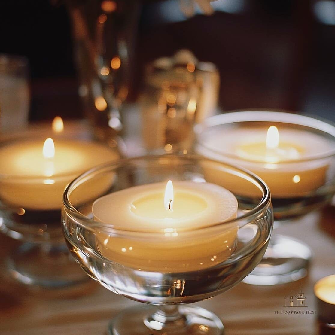 45 Brilliant Dining Room Table Centerpiece Ideas to Copy Right Now 19 Floating Candles in a Shallow Bowl