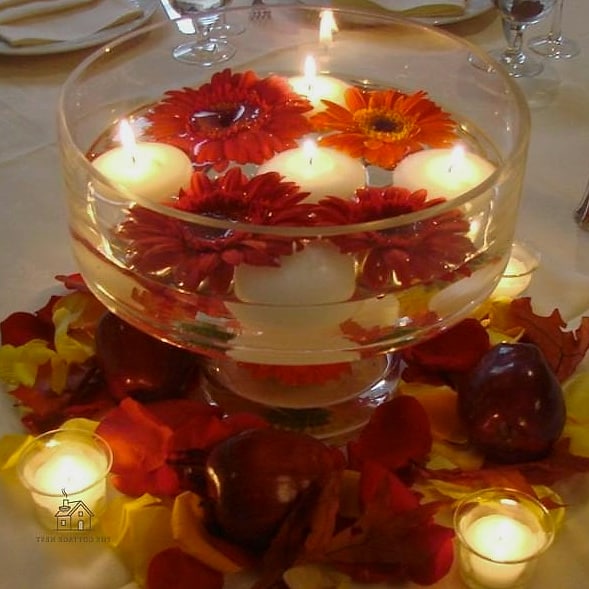 35 Beautiful Fall Table Centerpiece Ideas to Wow Your Guests 8 Floating Candles in a Copper Trough