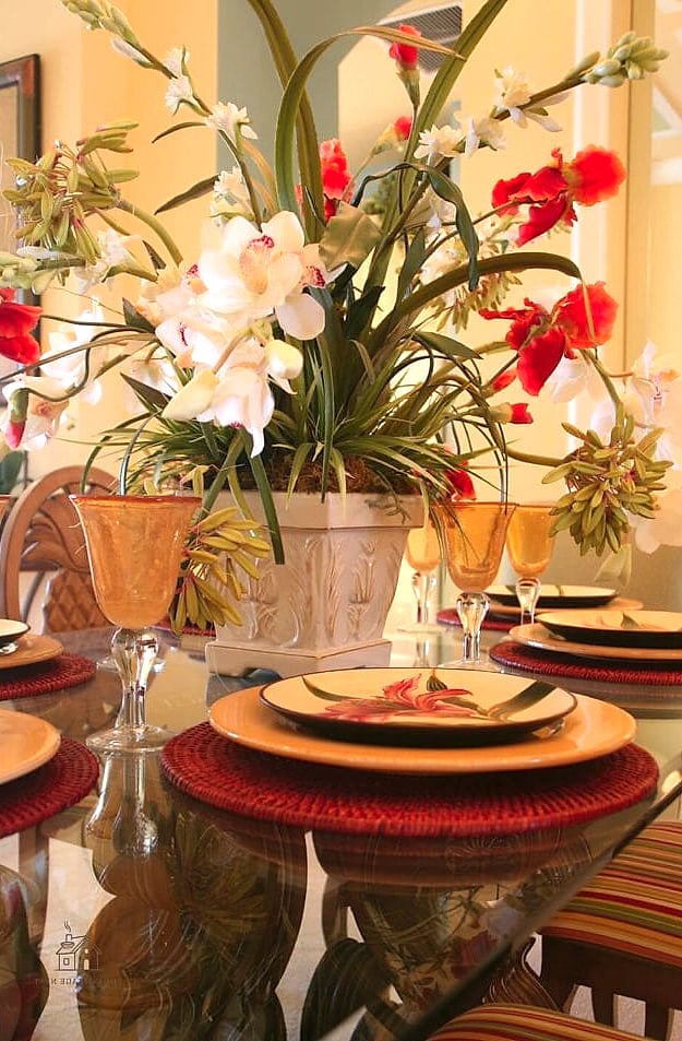 40 Beautiful Dining Room Table Decor Ideas to Transform Your Space 38 A Floral Arrangement in a Vintage Pitcher