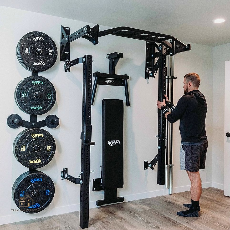 50 Beautiful Garage Gym Ideas to Transform Your Space 42 Foldable Equipment Wall