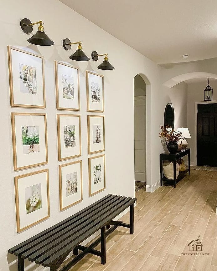 20 Cozy Apartment Entryway Ideas Worth Pinning 9 A Gallery Wall Above the Console