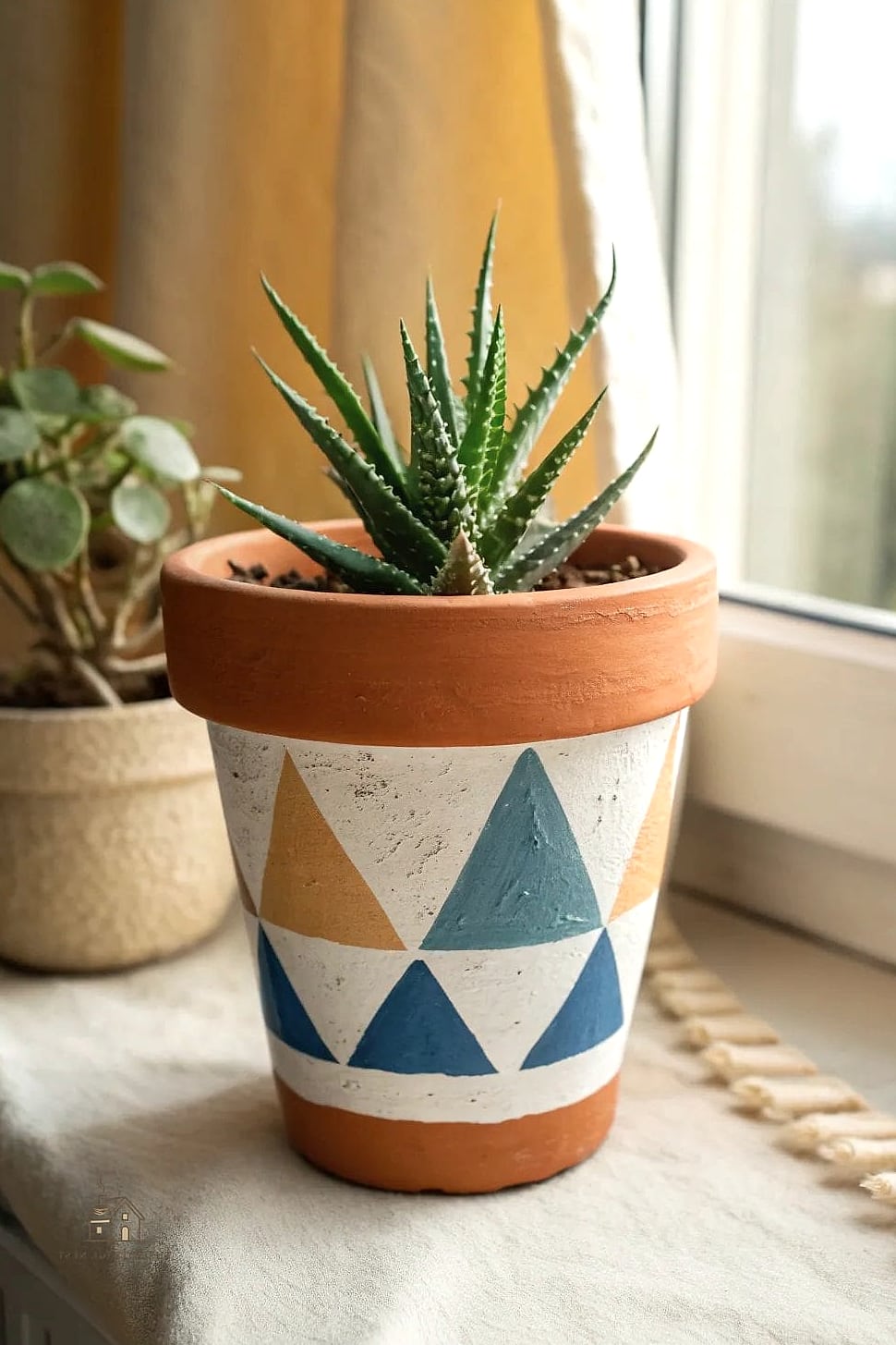 30 Amazing Flower Pots Painting Ideas on a Budget 4 Geometric Triangles in Two Tones