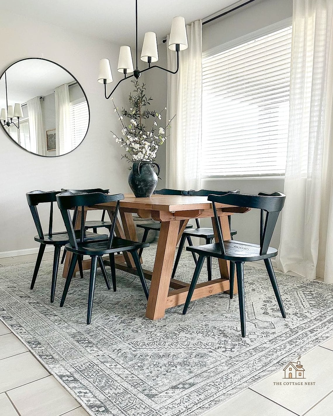 40 Clever Grey Dining Room Ideas for Every Style 25 Grey Statement Rug Under the Table