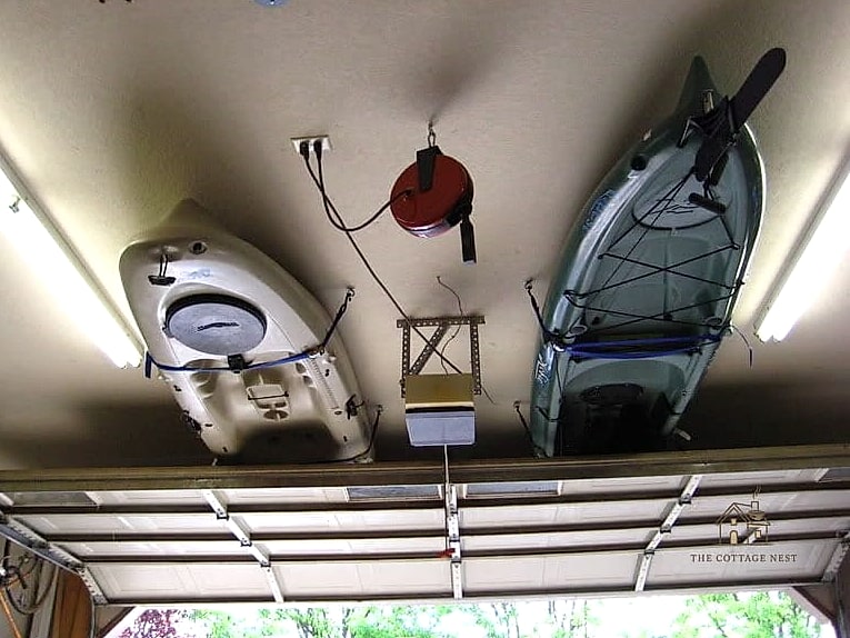 45 Stunning Garage Organization Ideas You'll Absolutely Love 34 Hanging Kayak and Paddle Storage