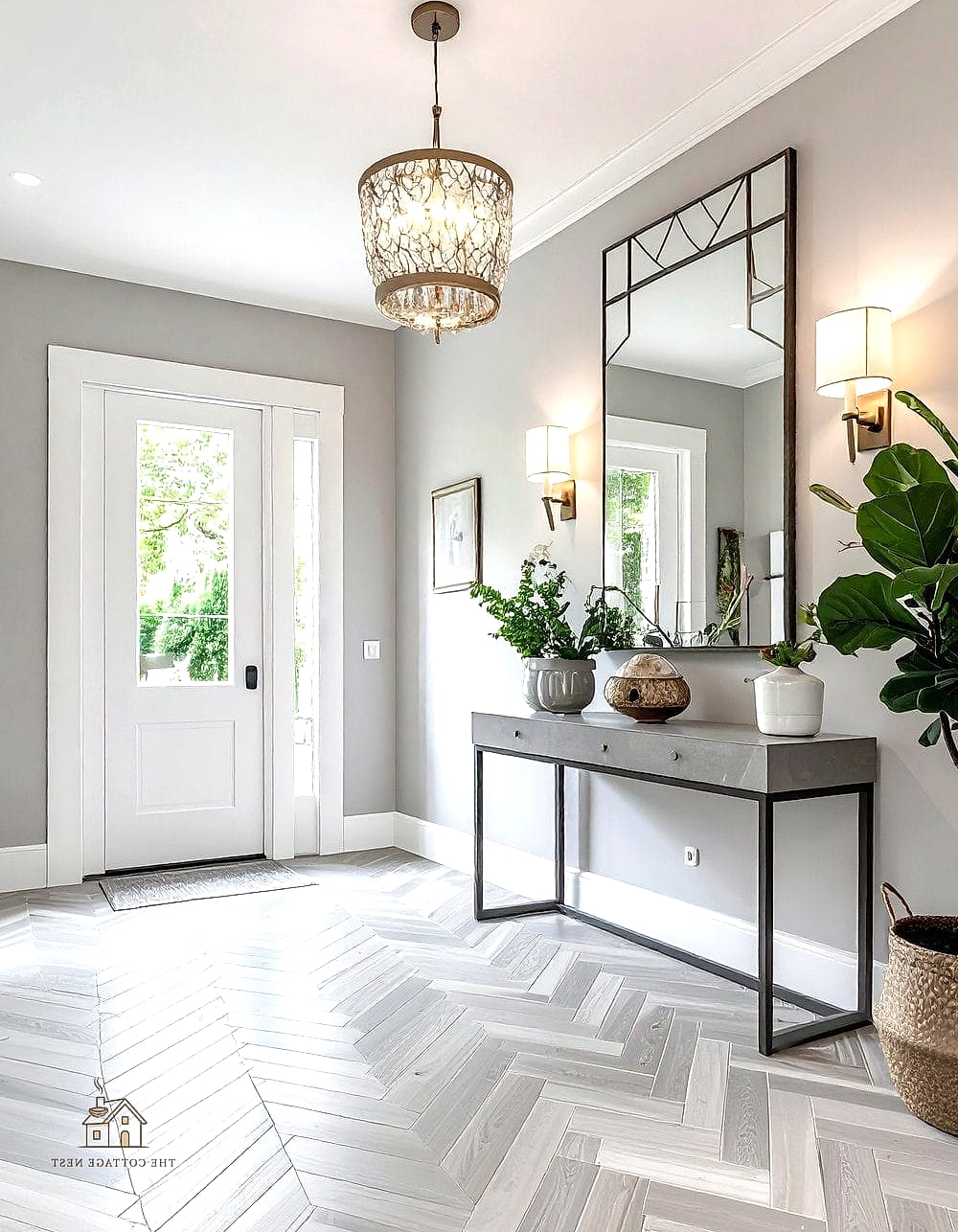 45 Stunning Small Entryway Ideas You'll Absolutely Love 18 A Herringbone Tile Floor