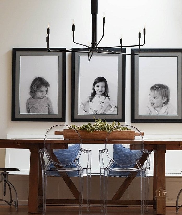 15 Stunning Dining Room Wall Decor Ideas You'll Absolutely Love 16 Layered Frames with Family Photos