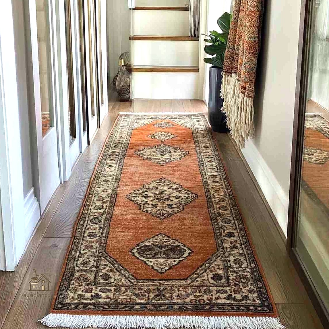 20 Cozy Entryway Runner Rug Ideas Worth Pinning 18 Layered Vintage Rugs for a Collected Look