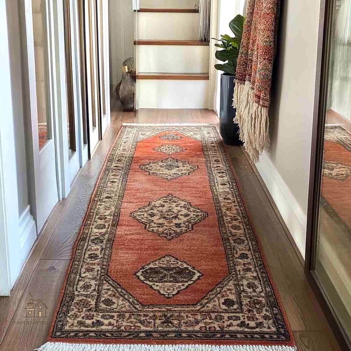 35 Brilliant Small Entryway Rug Ideas to Copy Right Now 29 Layered Vintage Runner Over Tile